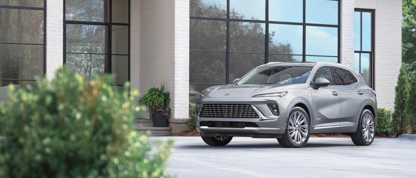 Buick envision parked outside a house